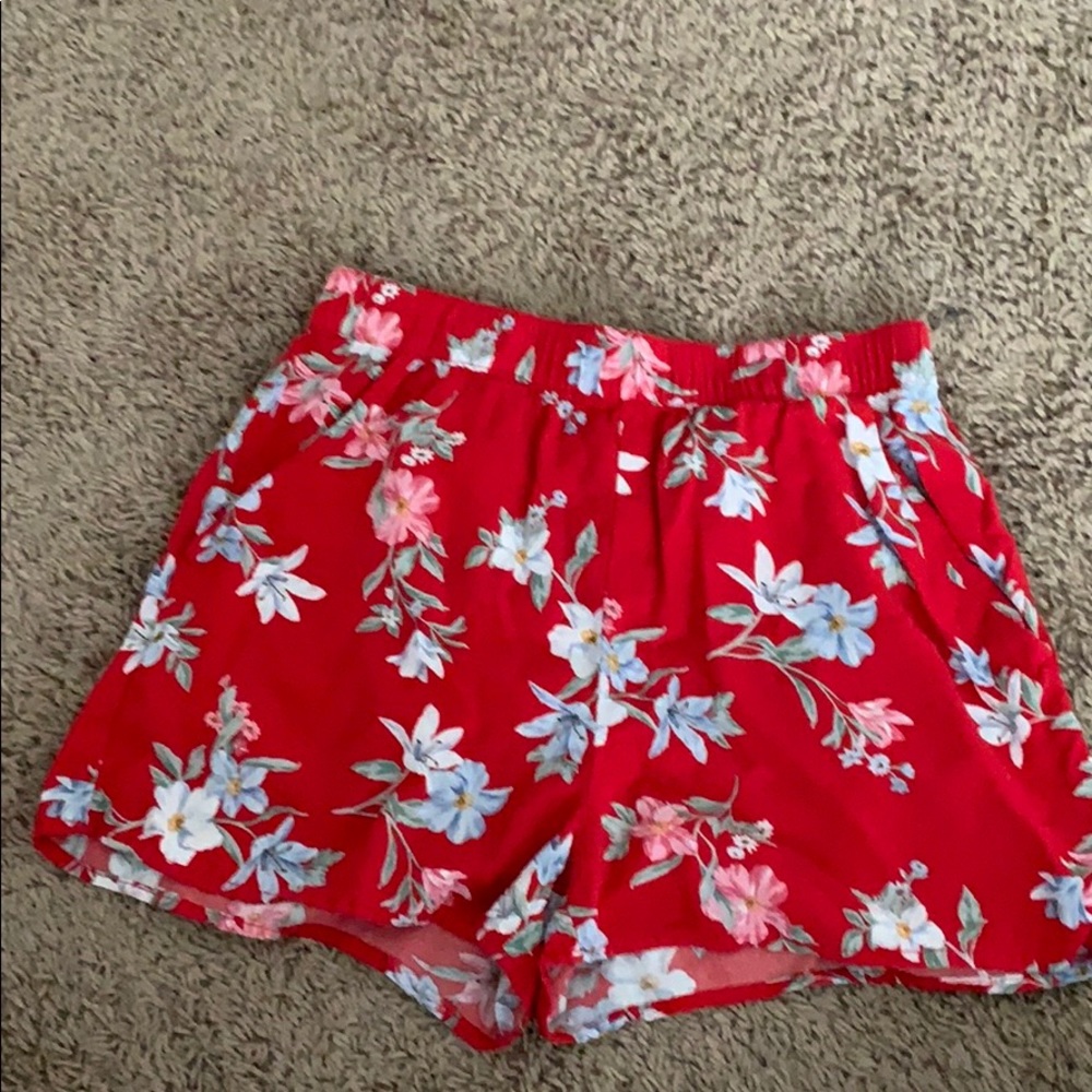 Red flowy shorts with flowers